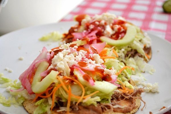 They both have a crunchy tortilla with soft fillings.