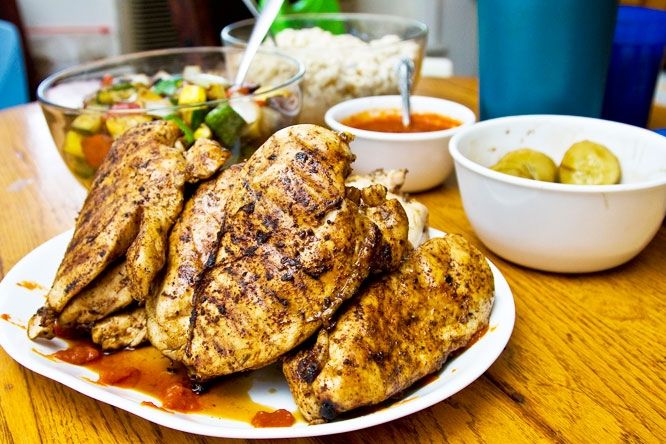 What is the proper internal temperature for cooked chicken?