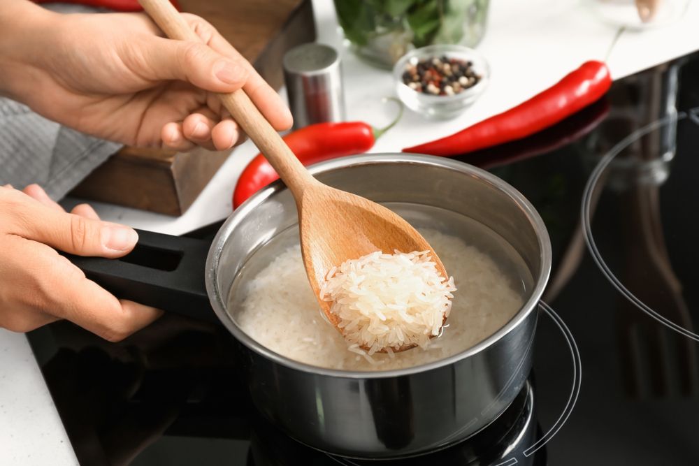 Cooking rice on the stovetop.