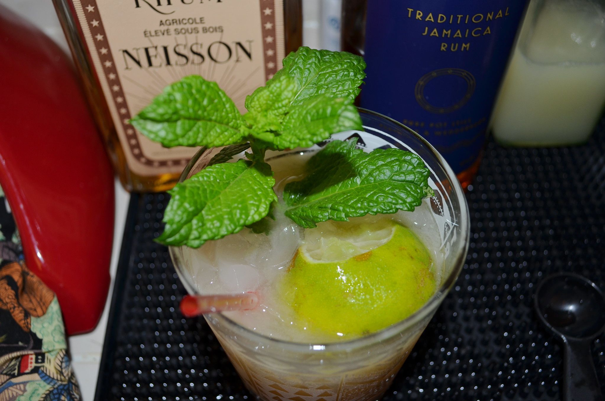 The traditional Mai Tai includes rum, orgeat syrup, Curaçao liqueur, and lime juice.